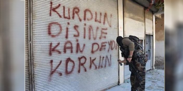 PKK'lı cesedini sürükleyen polisler meslekten atıldı