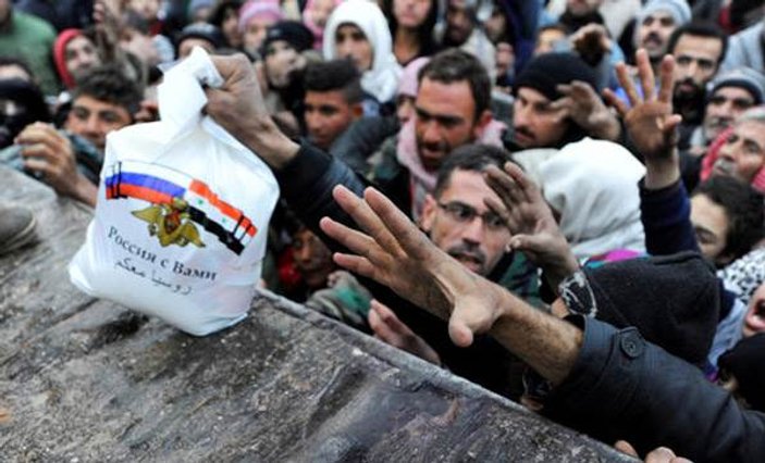 Halep'te yardım poşetlerinde Rusya sizinle mesajı