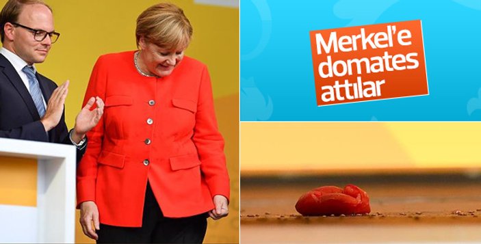 Merkel'in aracına domates attılar
