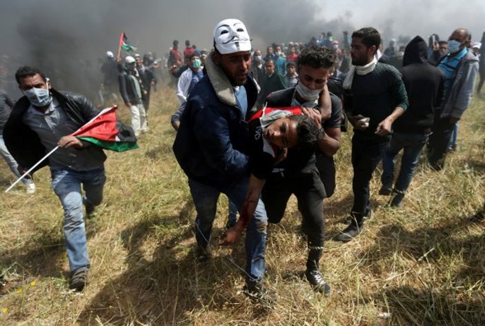 İsrail askerleri Gazze sınırında 250 Filistinliyi yaraladı