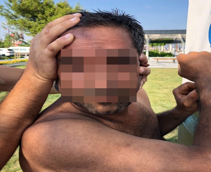 Plajda gizlice kadınları fotoğraflayan şahıs yakalandı