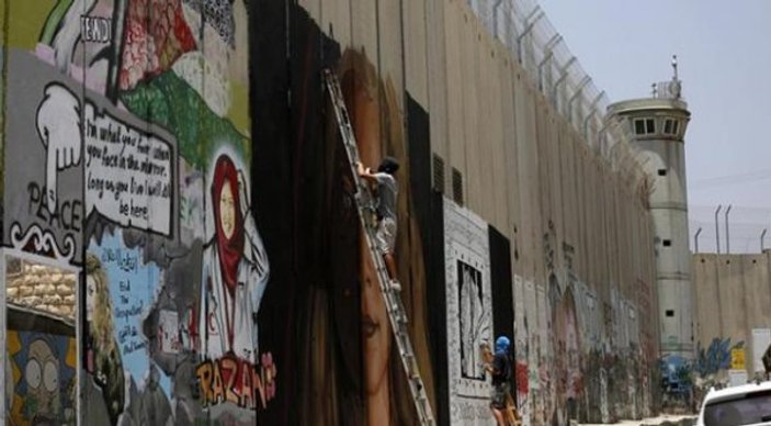 İsrail Temimi'nin grafitisini çizenleri kovdu