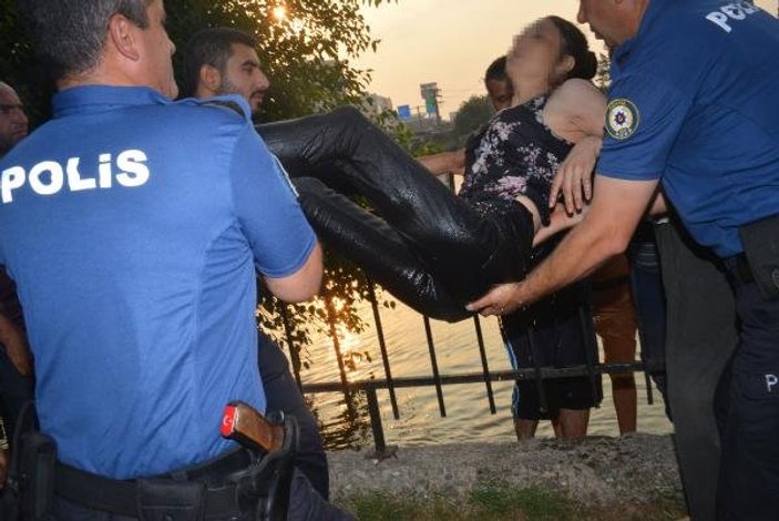 Nehre atlayan kadını vatandaşlar kurtardı
