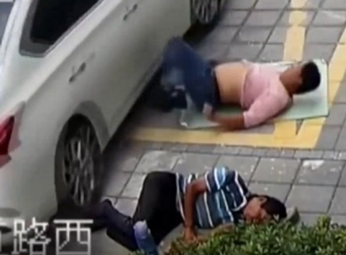 Çin'de otoparkta uyuyan işçiyi araba çiğnedi