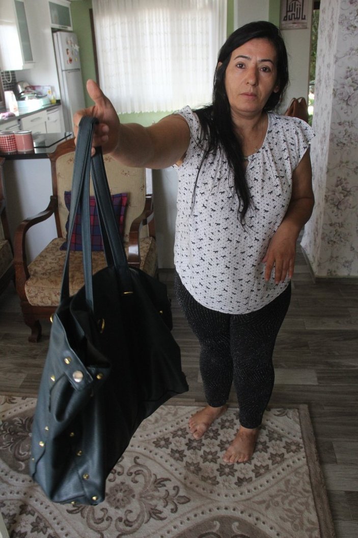 Eşine çanta fırlatan kadın 3 bin TL ceza ödedi