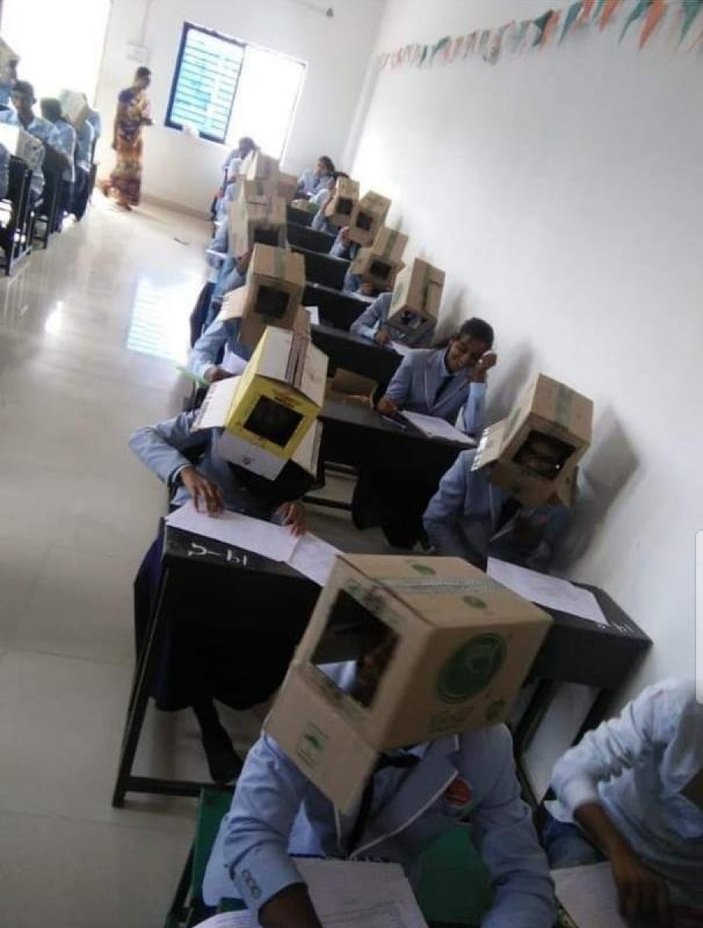 Hindistan'da bir okul kopyaya karton kutuyla önlem aldı