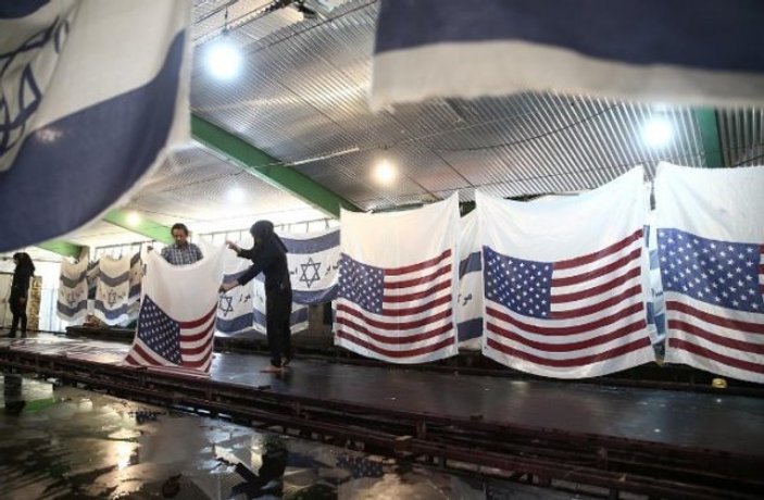 İran fabrikaları protestoculara özel ABD bayrağı üretiyor