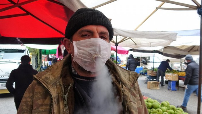 Tokat'ta sigara tiryakisinin maskeye sigara çözümü
