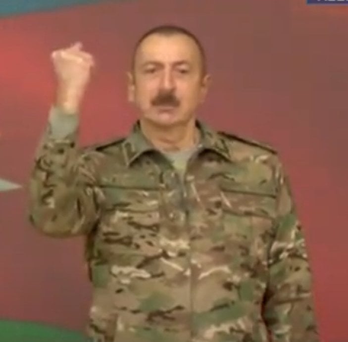 İlham Aliyev: Düşmanın başını eziyoruz