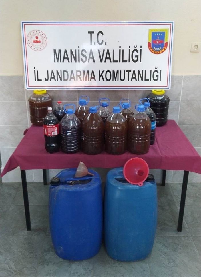 d Manisa'da 670 litre sahte içkiye el konuldu