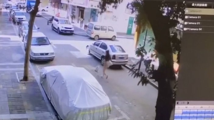 Çin'de ağacın altında kalmaktan koşarak kurtulan kadın
