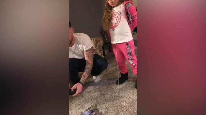 Küçük kızının dişini, drone ile çekti