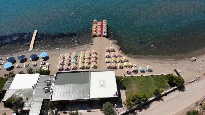 İ Assos'taki Cafer Mahiroğlu'nun kaçak restoran ve plajı yıkılacak