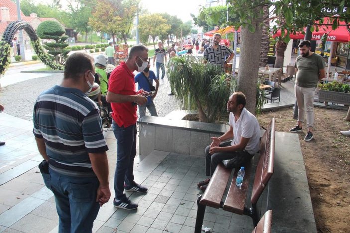 Antalya'da yerde yatan sarhoş adam, polis ekiplerine zorluk çıkardı