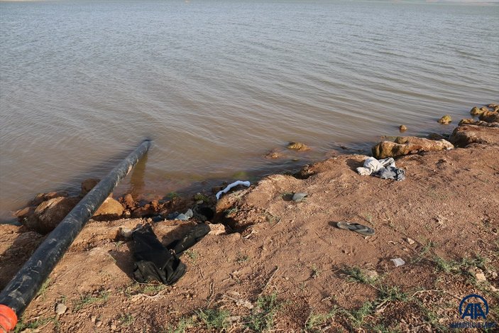 Hatay'da baraj gölüne giren iki kardeşten biri boğuldu