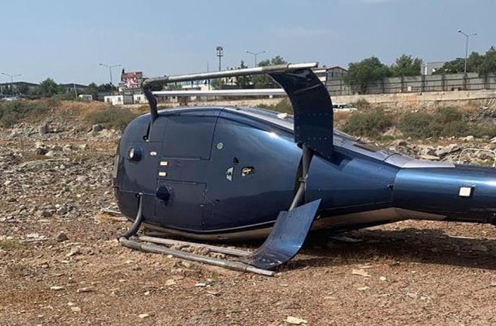 İzmir'de sivil helikopter kalkış sırasında yan yattı: 2 yaralı