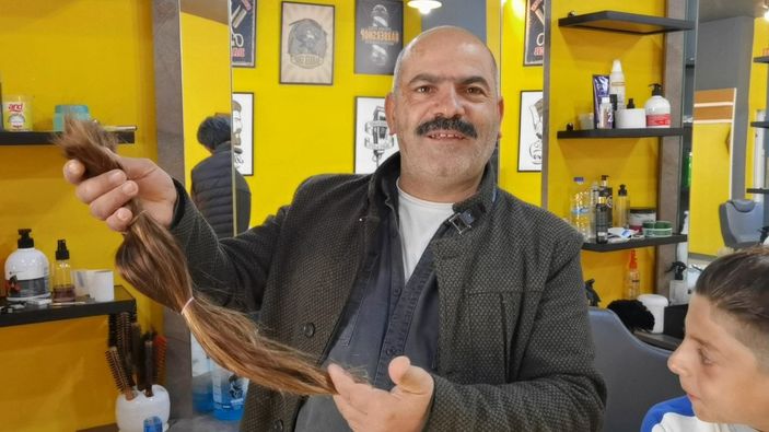 Bursa'da 12 yaşındaki çocuk ilk kez saçlarını kesti