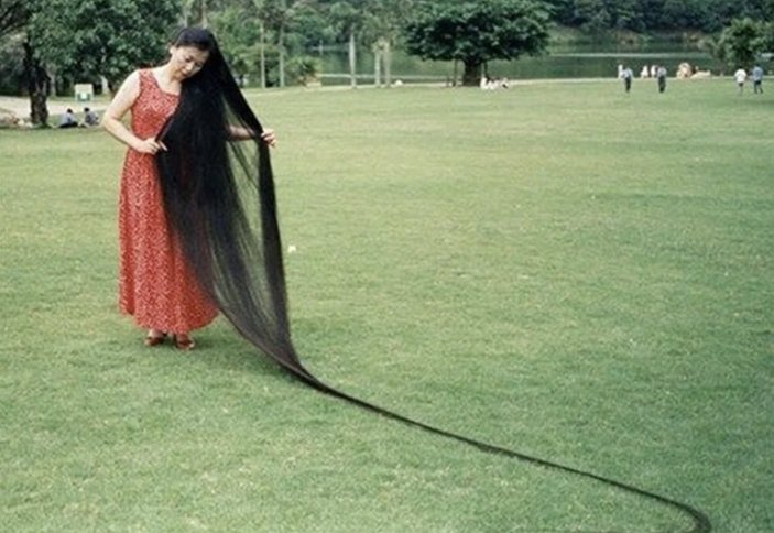 Çin'de saç uzunluğu 2.7 metre olan kadın