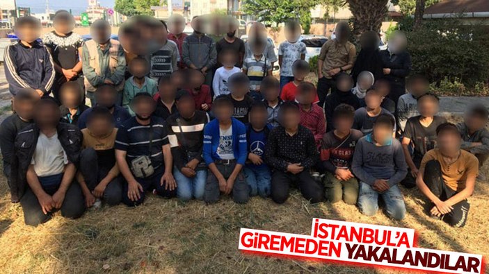 Kocaeli'de polisin durdurduğu araçta 50 kaçak göçmen yakalandı
