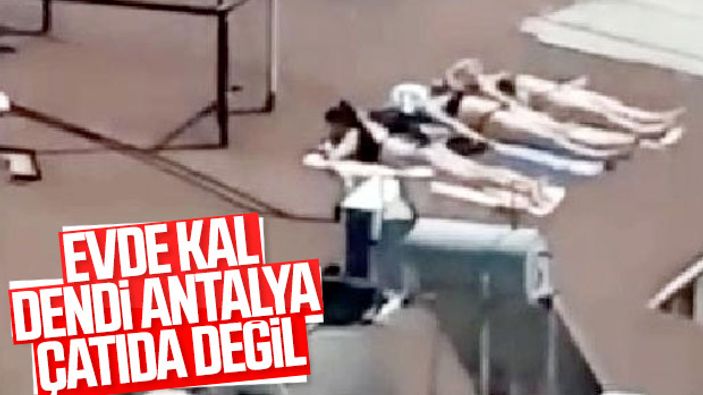 Sahile inemeyen Antalyalı kadınlar çatıda güneşlendi