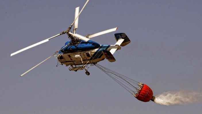 Yangınlarda su taşıma kapasitesi bakımından helikopter kullanılıyor