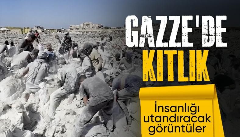 Gazze&#039;de kıtlık derinleşti: Filistinliler yere saçılan unları topluyor