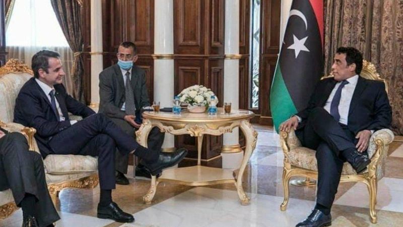 Muhammed Menfi'nin, Draghi ve Miçotakis karşısında rahat tavırları dikkat çekti