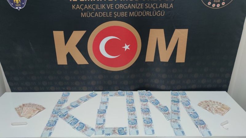 Denizli'de dolandırıcıların sahte parada mum yöntemi
