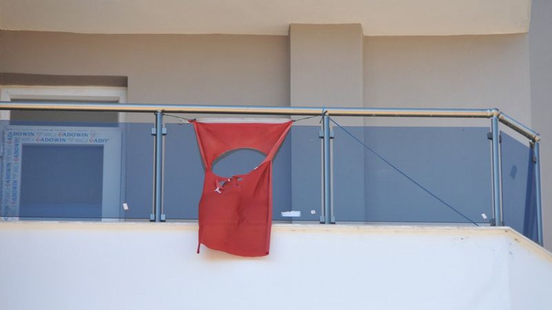 Antalya'da ay ve yıldızı kesilen Türk bayrağı indirildi