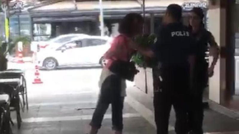 Adana’da, polise hakaretler yağdırıp ölümle tehdit eden kadın kamerada