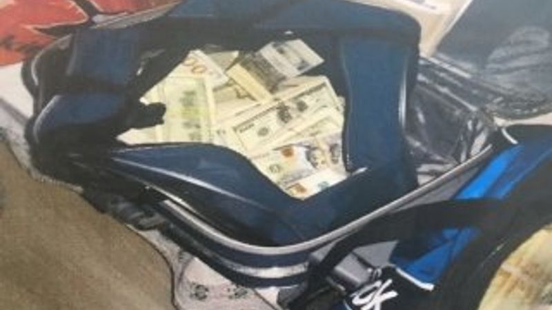FETÖ'cü memurun evinde bavul dolusu para bulundu