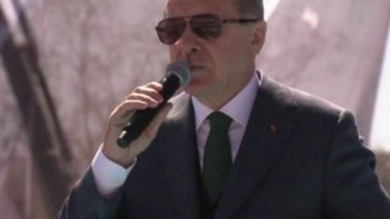 Erdoğan'dan İsviçre'deki pankarta sert tepki