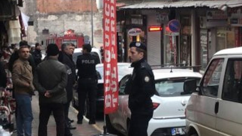 Elinde tüfek ve benzin bidonuyla dükkan bastı