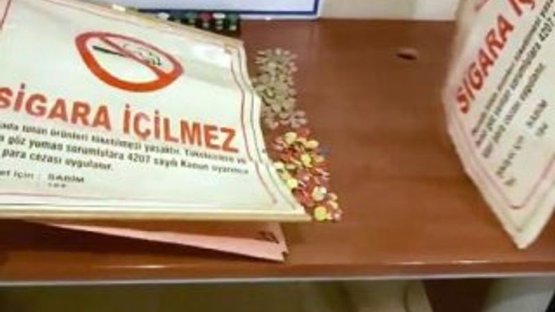 'Sigara içilmez' tabelasının arkasından tombala çıktı
