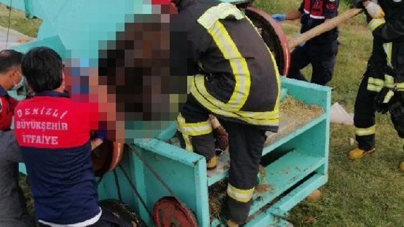 Denizli'de hasat yapan çiftçi patoz makinesine düştü
