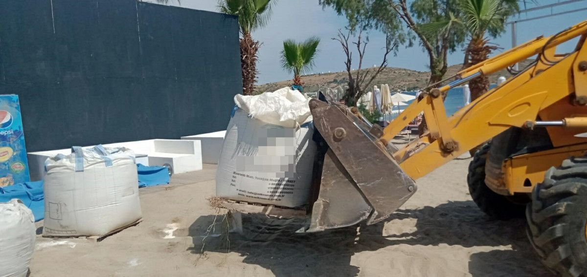 Bodrum da plaja beyaz kum sermek isteyen otele idari yaptırım #3