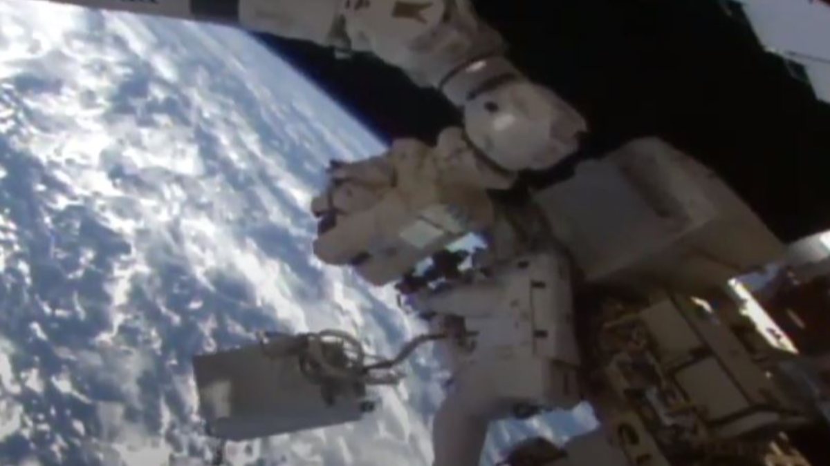 International Space Station astronauts go on a spacewalk