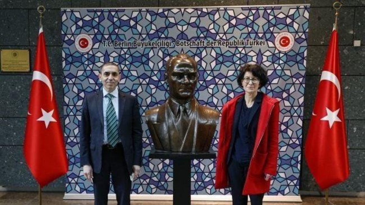 Posing with Atatürk bust by Özlem Türeci and Uğur Şahin