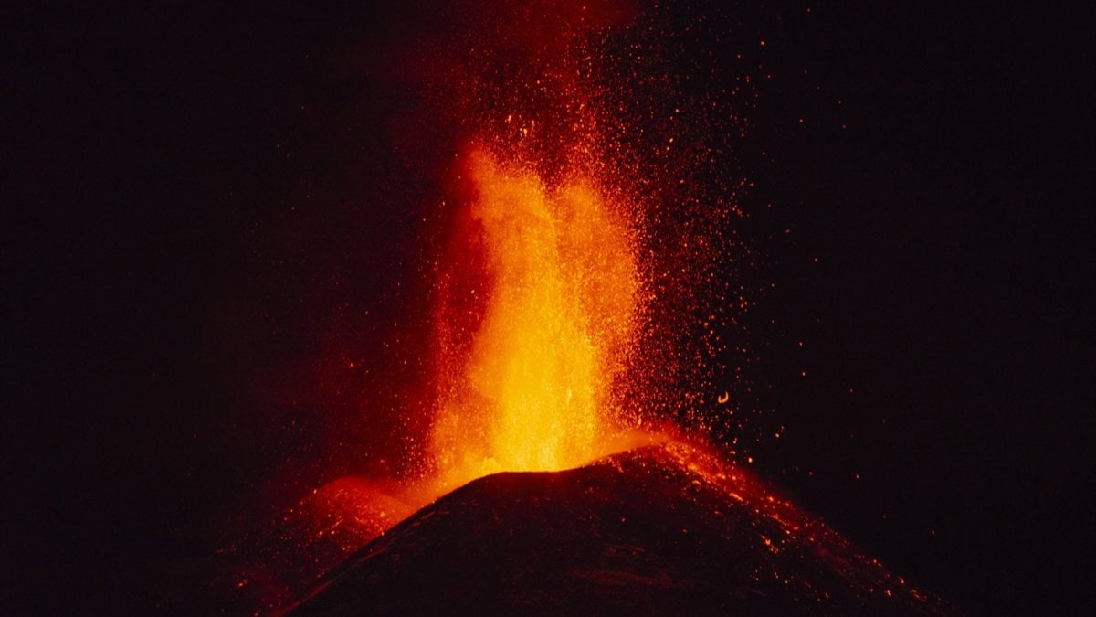 Mount Etna spews lava and ash