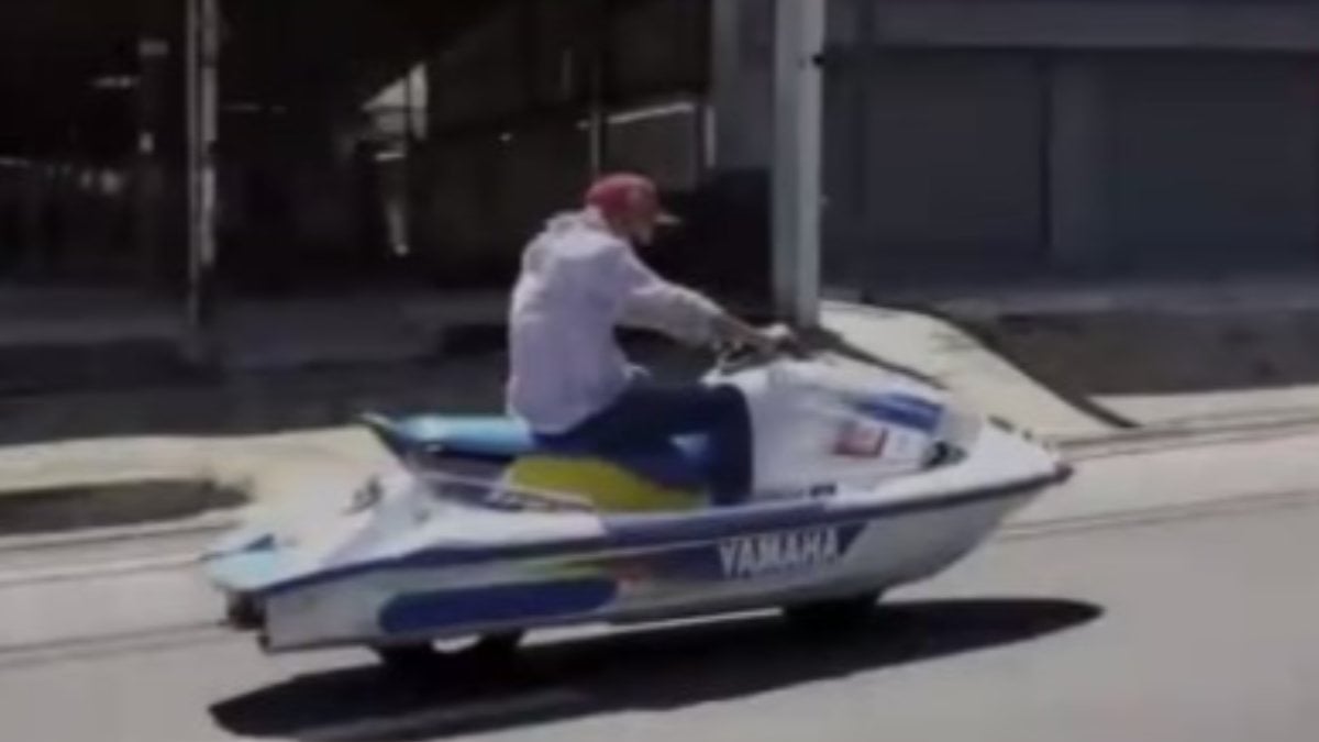 Thai man who puts wheels on a jet ski and goes to the highway