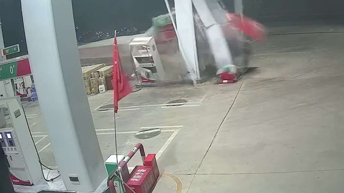Truck driver crashes into gas station in China