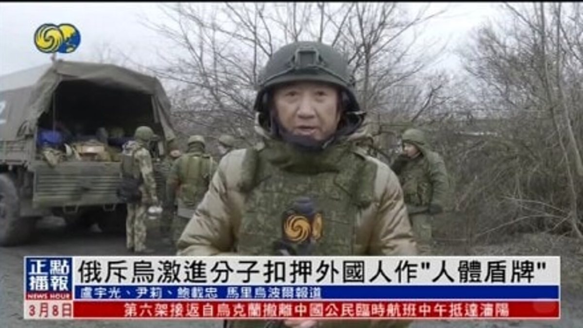 Chinese reporter broadcast from among Russian troops