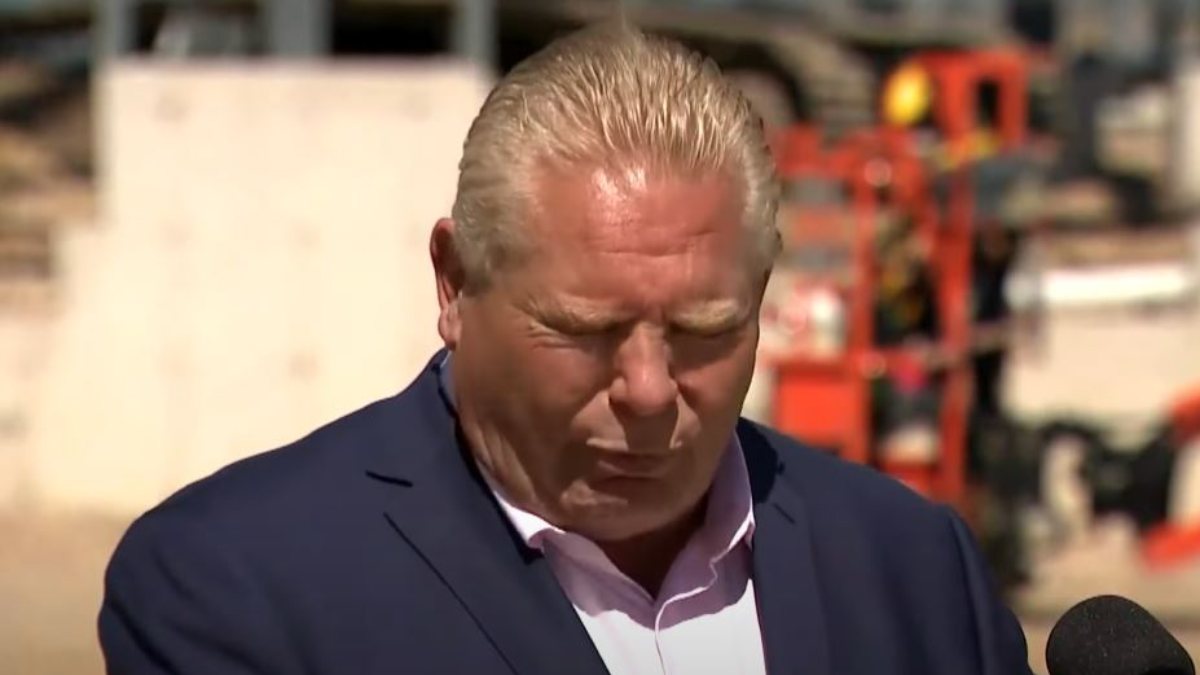 Ontario Prime Minister Ford chews on a bee while talking