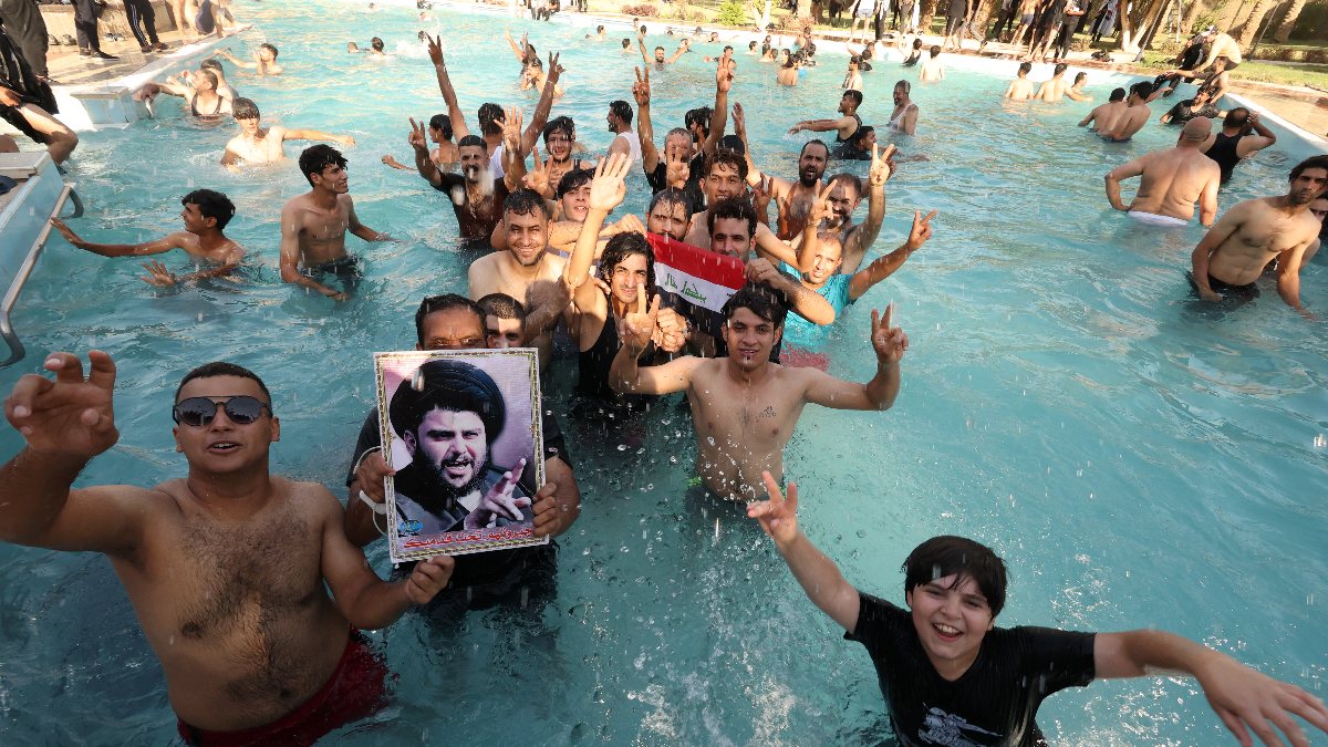 Sadr supporters swam in the pool at the Presidency