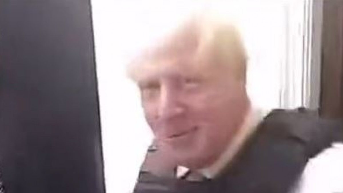 When he woke up in England he saw Boris Johnson at his home with the cops