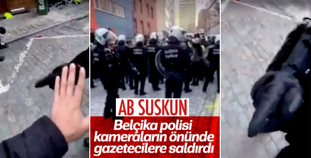 Belçika'da polisler basın mensuplarını tartakladı