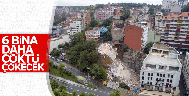 Çöken binanın yanındaki binalarda da çatlaklar oluştu