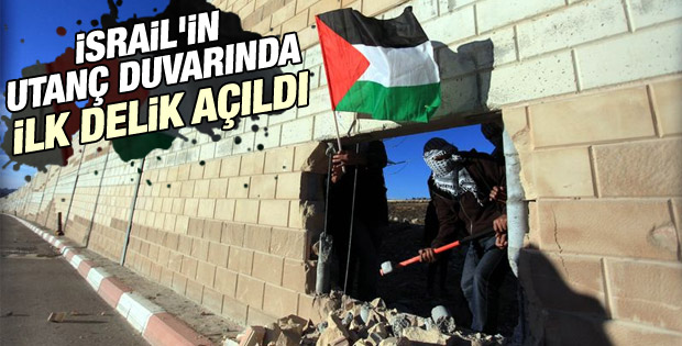 Filistinliler Ayrım Duvarı'na delik açıp bayrak diktiler İZLE