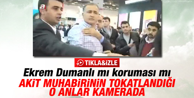 Ekrem Dumanlı'nın koruması TÜYAP'ta gazeteci tokatladı