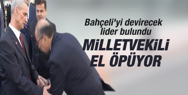 MHP'li vekil Engin Alan'ın elini öpmek istedi